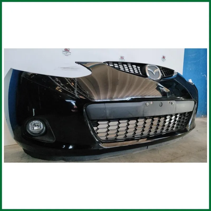 PARAURTI ANTERIORE COMPLETO MAZDA 2 ANNO 2009 COL.NERO ALCUNI SEGNI VEDI FOTO