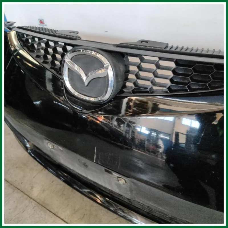 PARAURTI ANTERIORE COMPLETO MAZDA 2 ANNO 2009 COL.NERO ALCUNI SEGNI VEDI FOTO