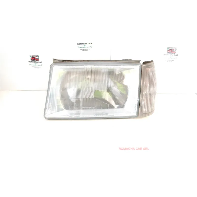 PROIETTORE C/CORRETTORE ASSETTO FARI SX. LANCIA THEMA (09/92-12/94) 2.0 16V BER. 4P/B/1995CC.